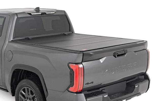 Rough Country - Hard Tri-Fold Flip Up Bed Cover - 5'7 In. - Toyota Tundra 2WD/4WD (2022-2025)